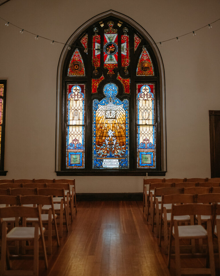 wedding venue in newport with historic stained glass window
